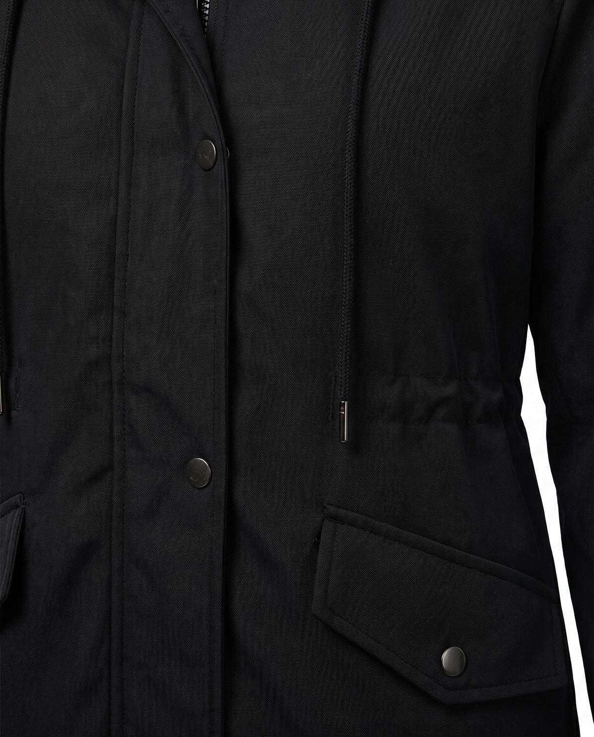 Close up of the snap button storm placket, waist drawstring and flap pocket