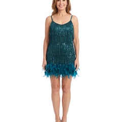 Model wearing the teal fringe feather-hem mini dress, front standing
