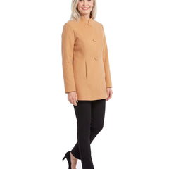Model wearing the apricot stand collar coat, three-quarter walking pose