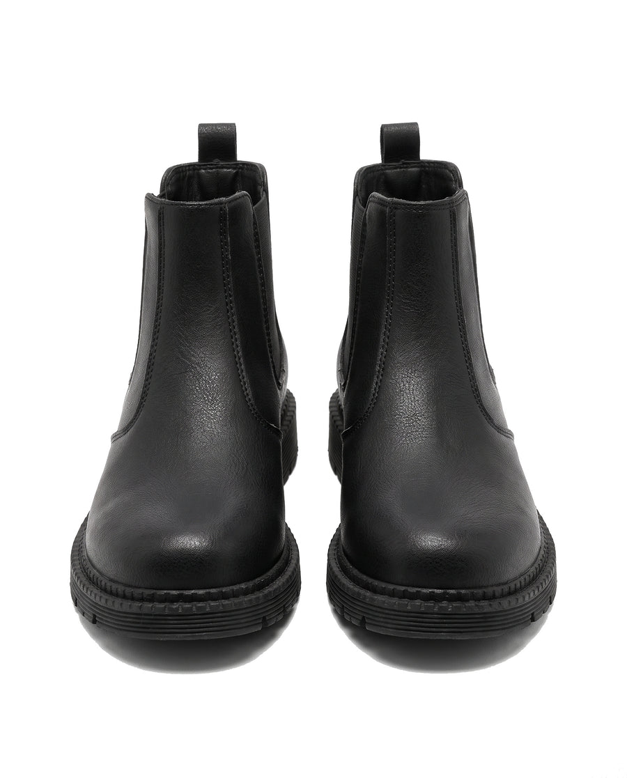 Women's black lug sole Chelsea boots, front view