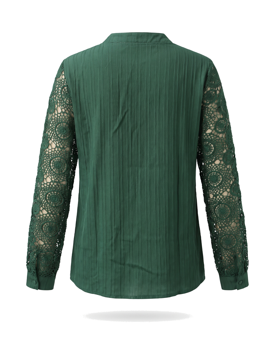 Back view of the green blouse showing the plain back and crochet lace sleeves