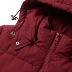 Close-up of the snap-off hood, drawcord toggle and front zip