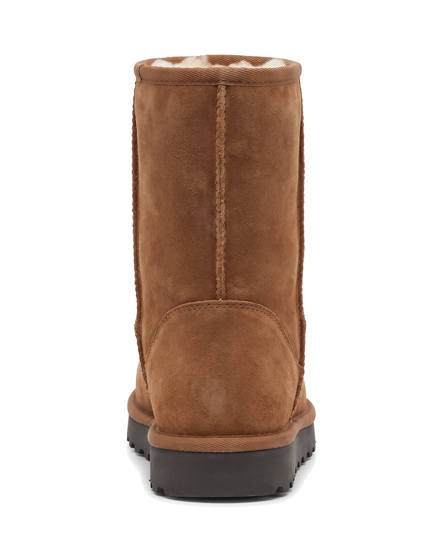 Back view of the brown pull-on boot showing the center back seam and heel panel