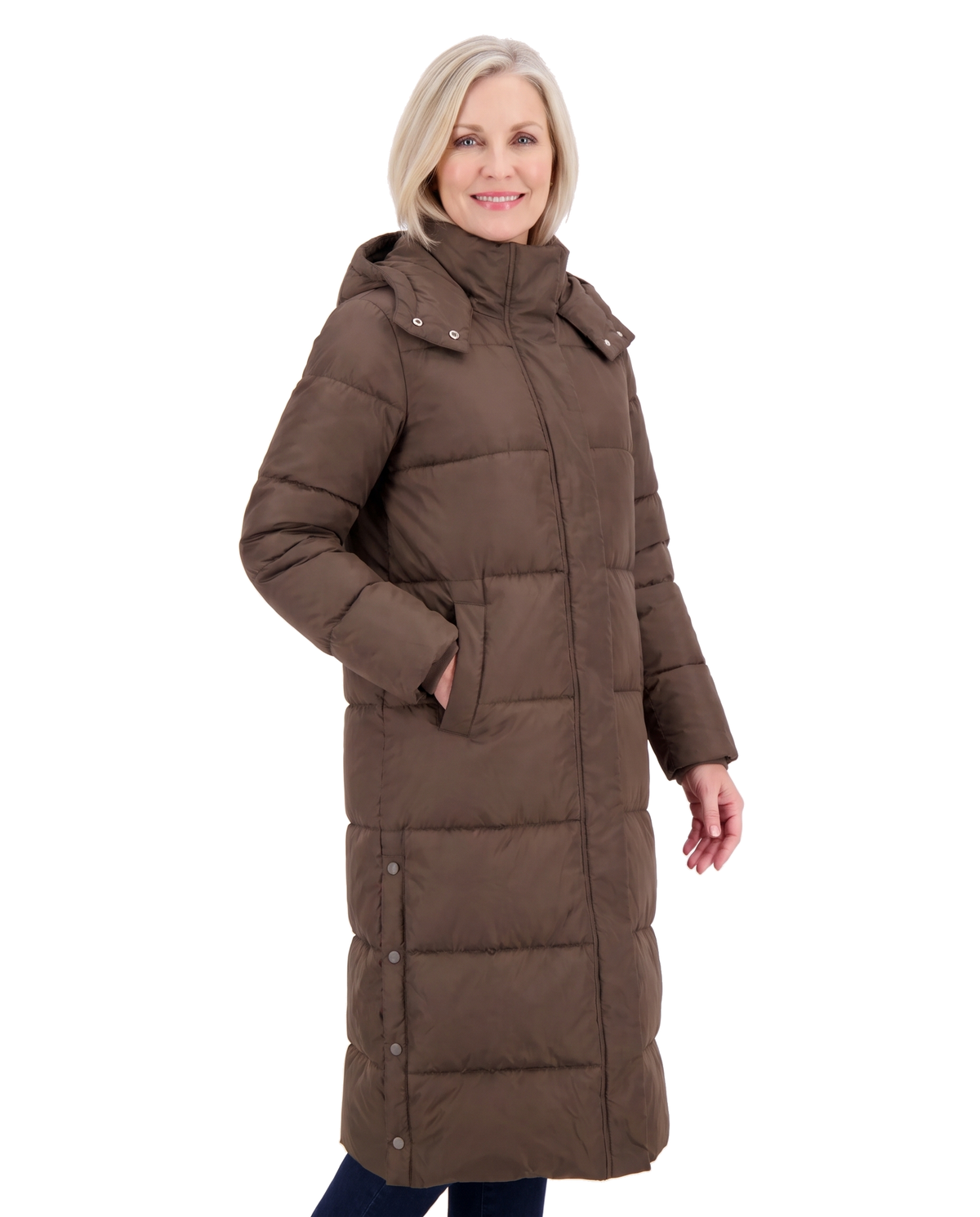 Model wearing the caffe brown long hooded puffer coat, three-quarter pose