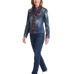 Woman walking in the blue denim military jacket, three quarter view on white