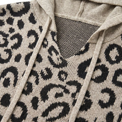 Close up of the V neck, drawstring ties and leopard knit stitch