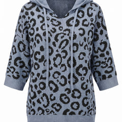 Blue leopard print hooded knit sweater front view on a white background