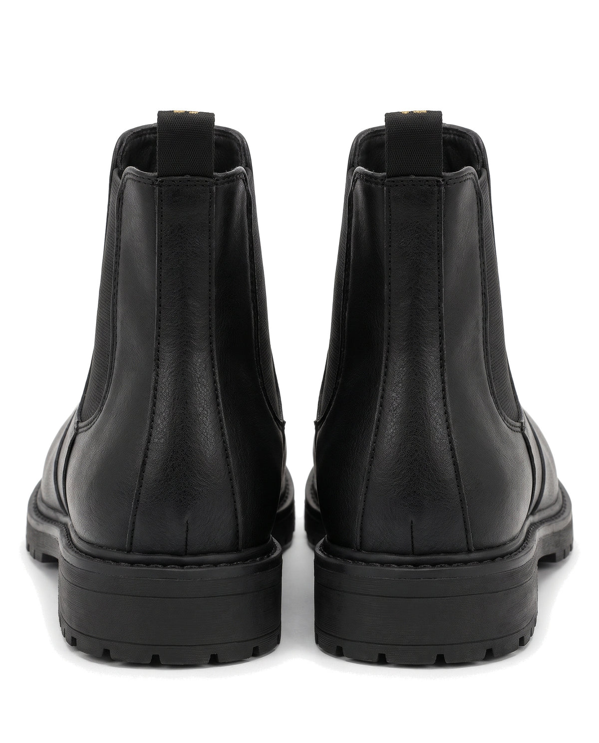 Women's black lug sole Chelsea boots, back view