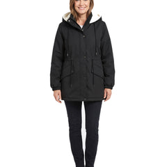 Woman wearing the black fleece lined hooded parka jacket, front standing pose
