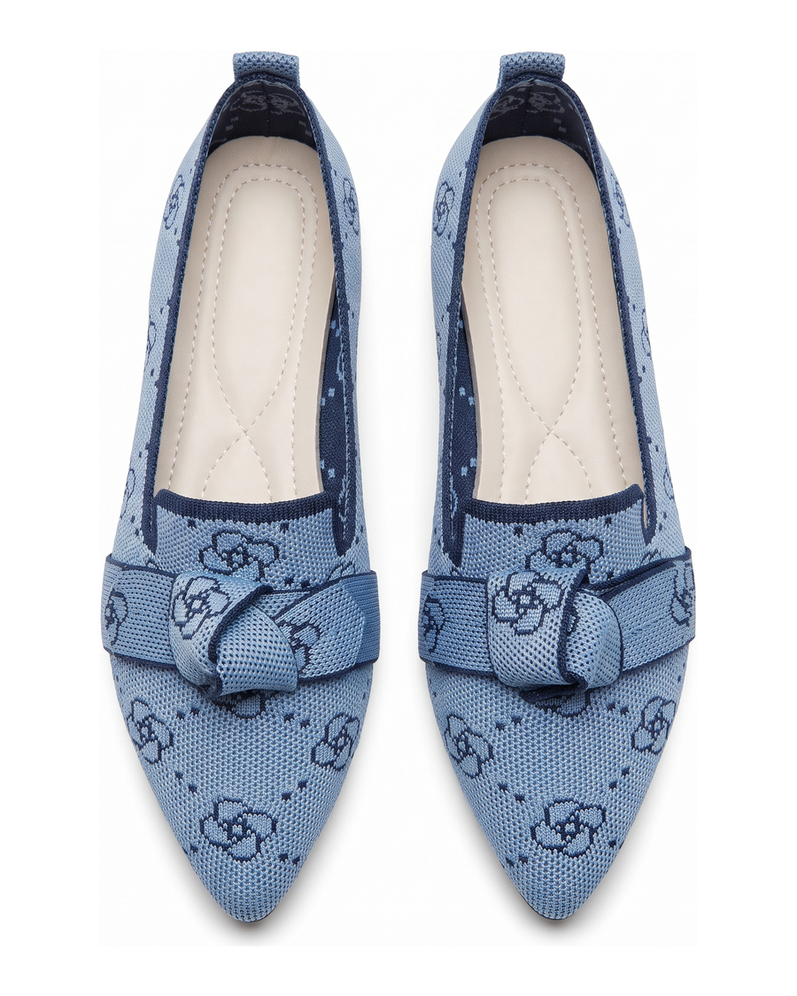 Women's floral knit pointed toe flats with bow strap in light blue, front view on white background