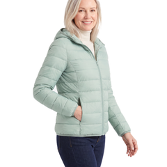 Model wearing the green hooded puffer jacket, three quarter view