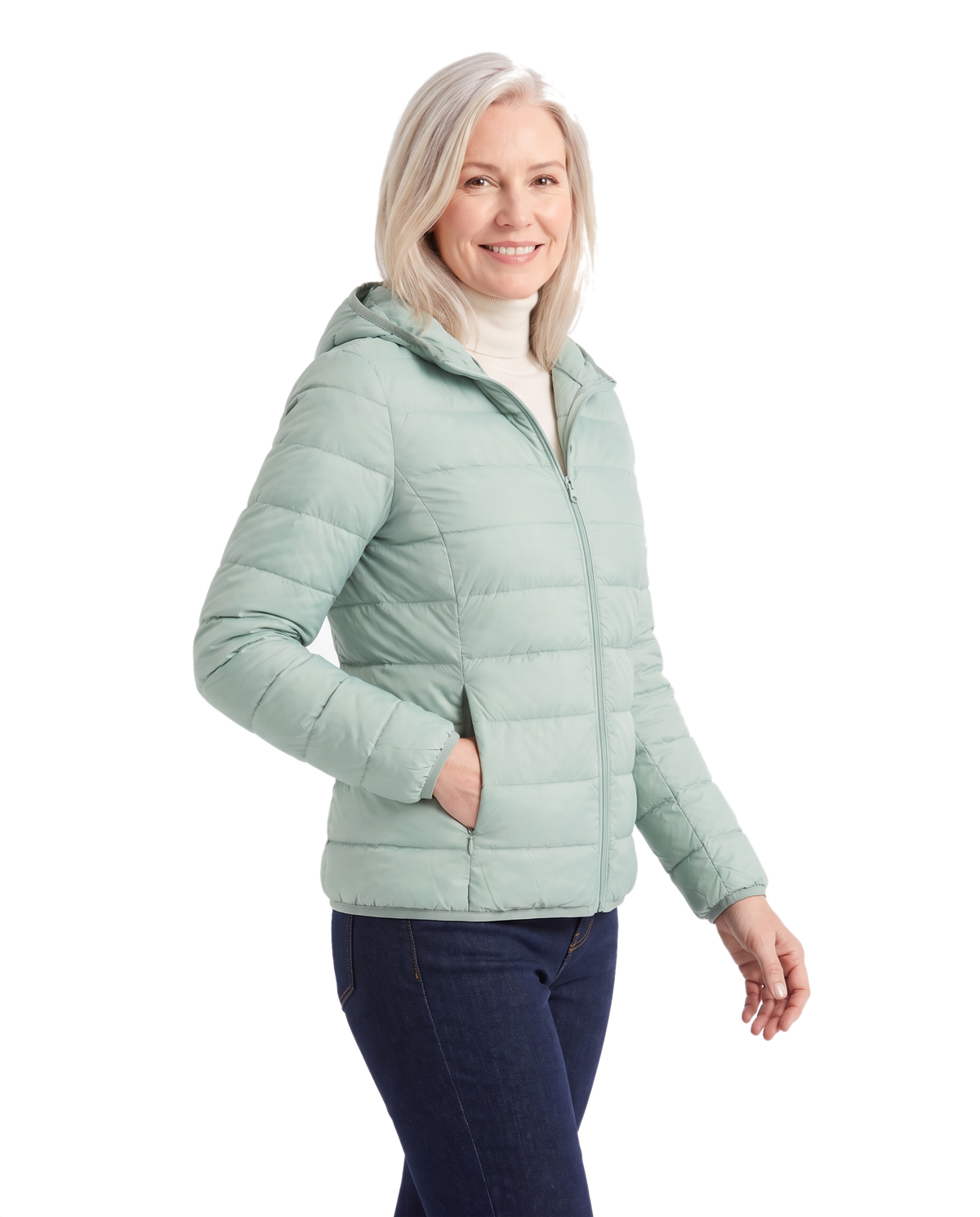 Model wearing the green hooded puffer jacket, three quarter view
