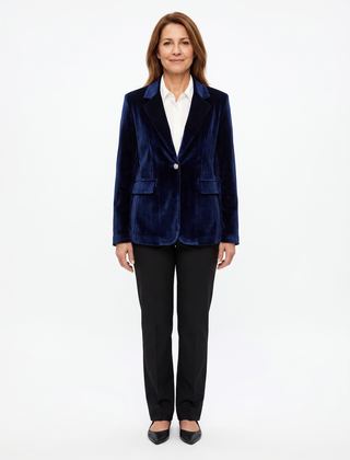 Woman wearing the navy velvet blazer, front view