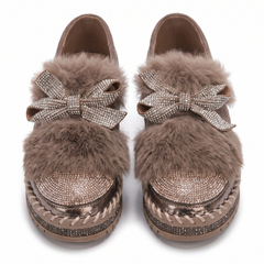 Brown crystal bow platform loafers with faux fur trim, front view on white