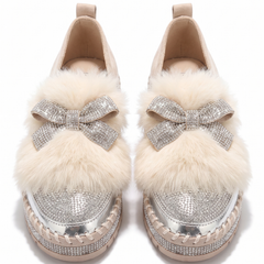 Silver crystal bow platform loafers with faux fur trim, front view on white