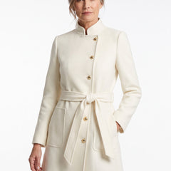 Olive Women's Belted Wool-Blend Trench Coat in ivory, worn by a model, studio white background