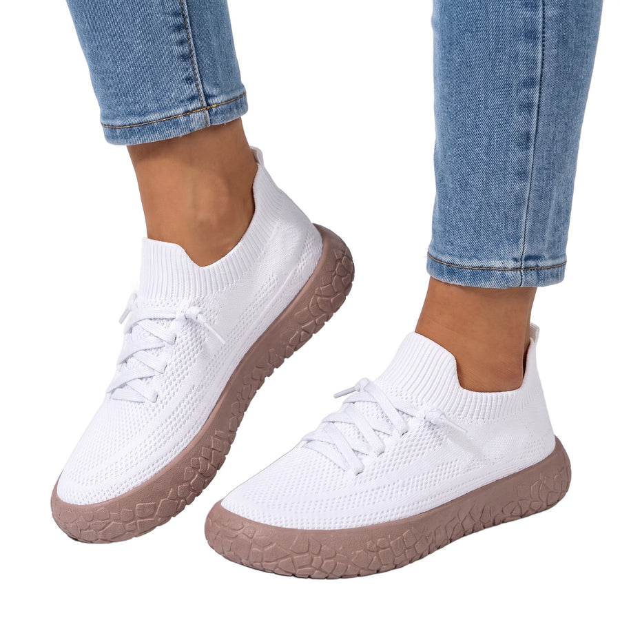 Viola Women's Knit Mesh Slip-On Sneakers in white worn with cropped jeans