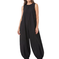 Woman wearing the black oversized balloon wide-leg jumpsuit