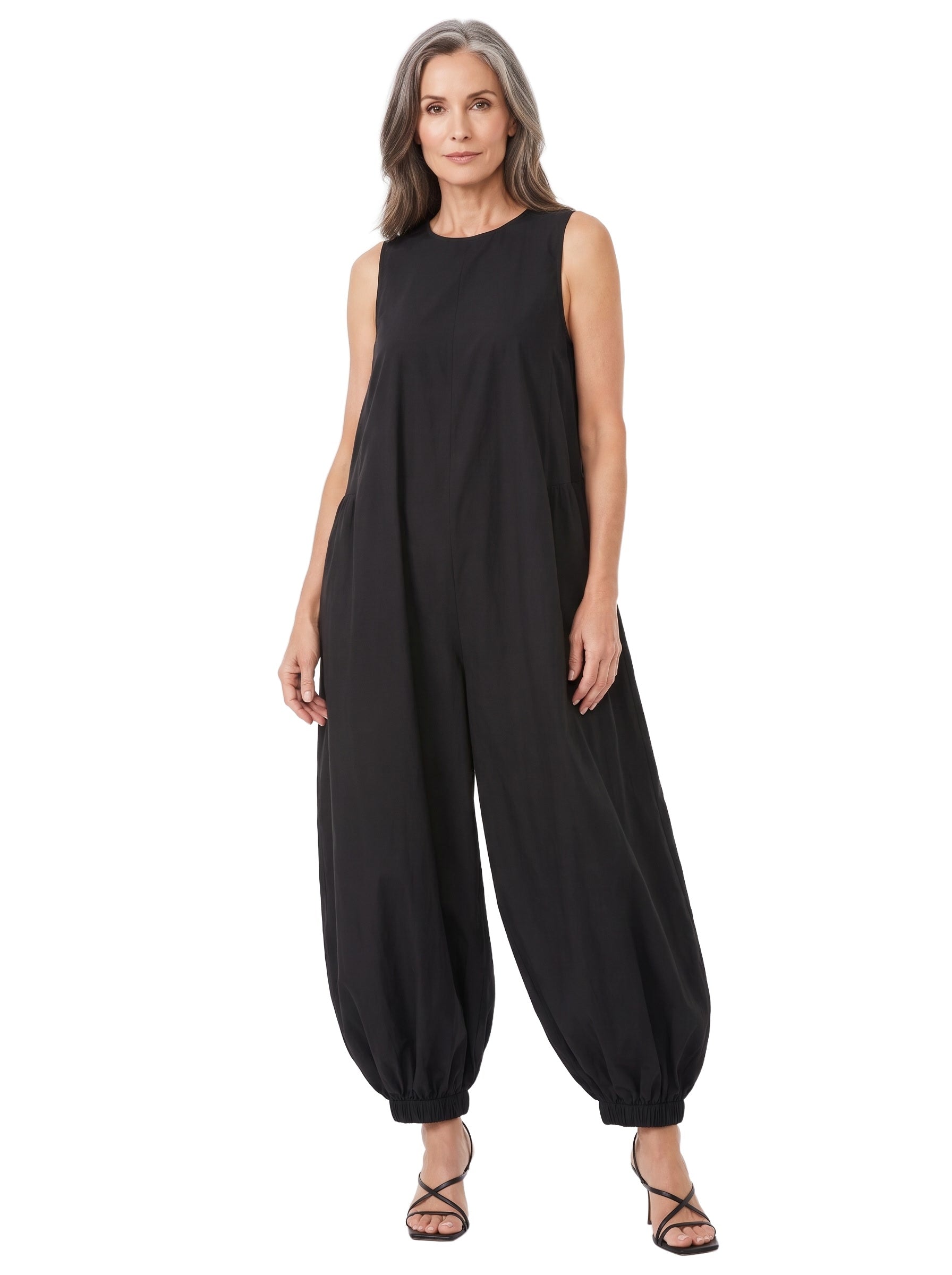 Woman wearing the black oversized balloon wide-leg jumpsuit