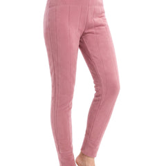 Woman wearing dusty pink quilted wool fleece lined dress pants, studio white background
