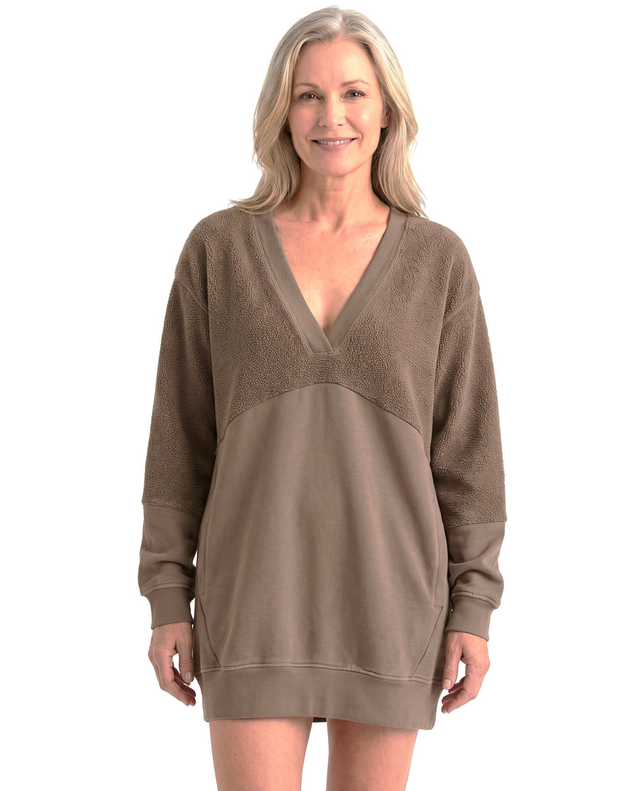Woman wearing taupe fleece-panelled cotton mini dress
