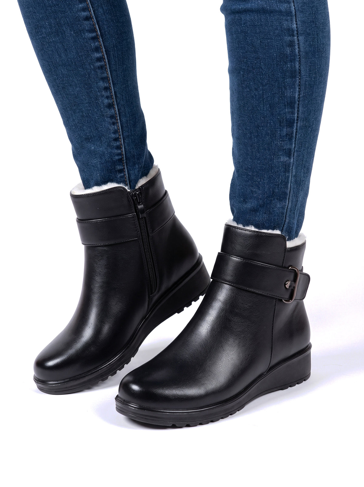 Irene-Phyllis Women's Faux Fur-Lined Ankle Boots in black worn with jeans