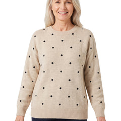 Violet-Nora Women's Dotted Crew-Neck Jumper in beige with black dots, worn by a model