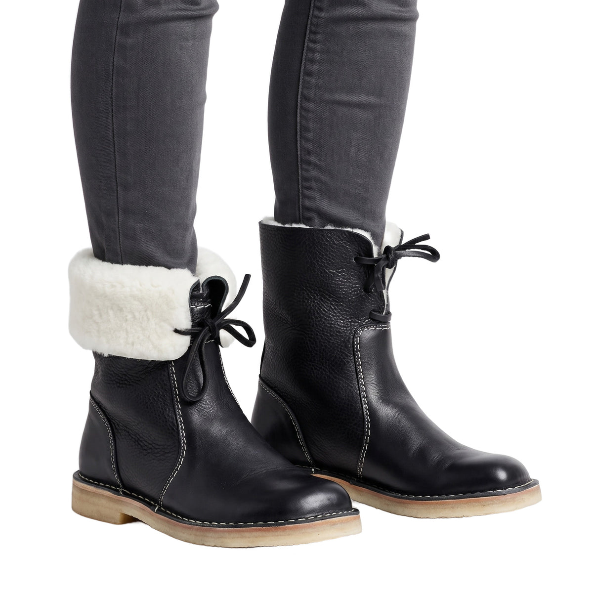 Joyce-Bianca Women's Wool-Lined Suede Ankle Boots in black worn on model