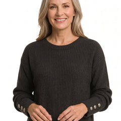 Iris-Roberta Women's Relaxed Cable Knit Sweater in black with silver cuff buttons