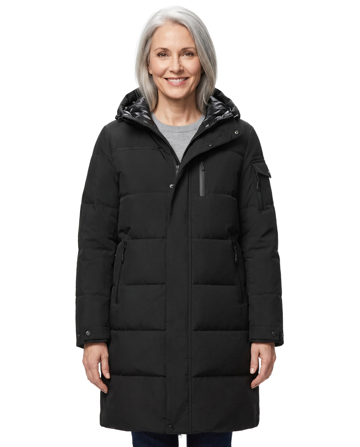 Magda Women's Hooded Longline Puffer Coat in Black worn by a model