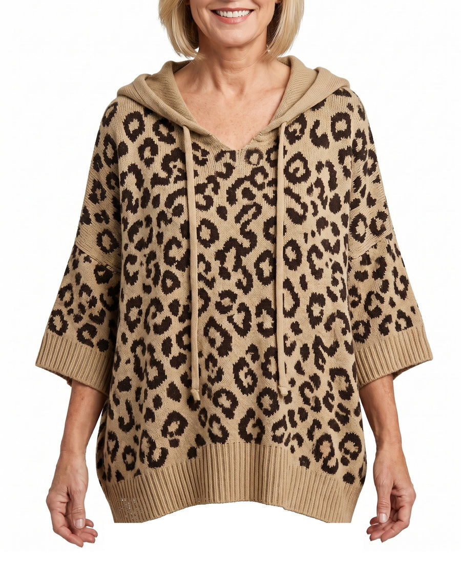Thelma Women's Oversized Animal Print Hoodie Sweater in khaki leopard knit worn by a model