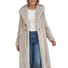 Petra Women's Longline Hooded Puffer Coat worn open over a white top and jeans