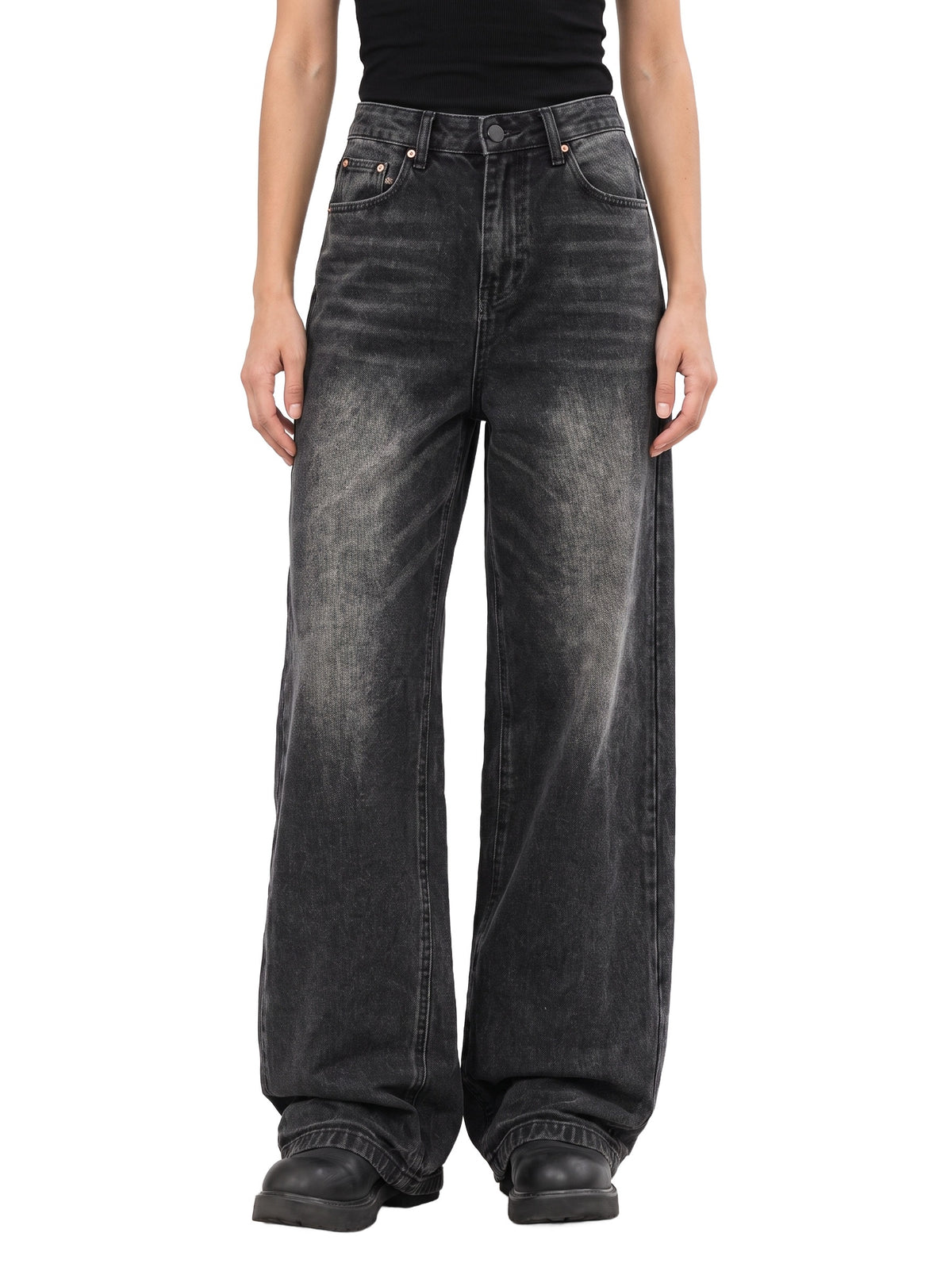 Odette Women's Wide-Leg Flared Jeans in Black, worn by a model, front view