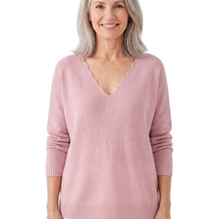 Bernadette Women's Scalloped V-Neck Sweater in pink, worn by a model