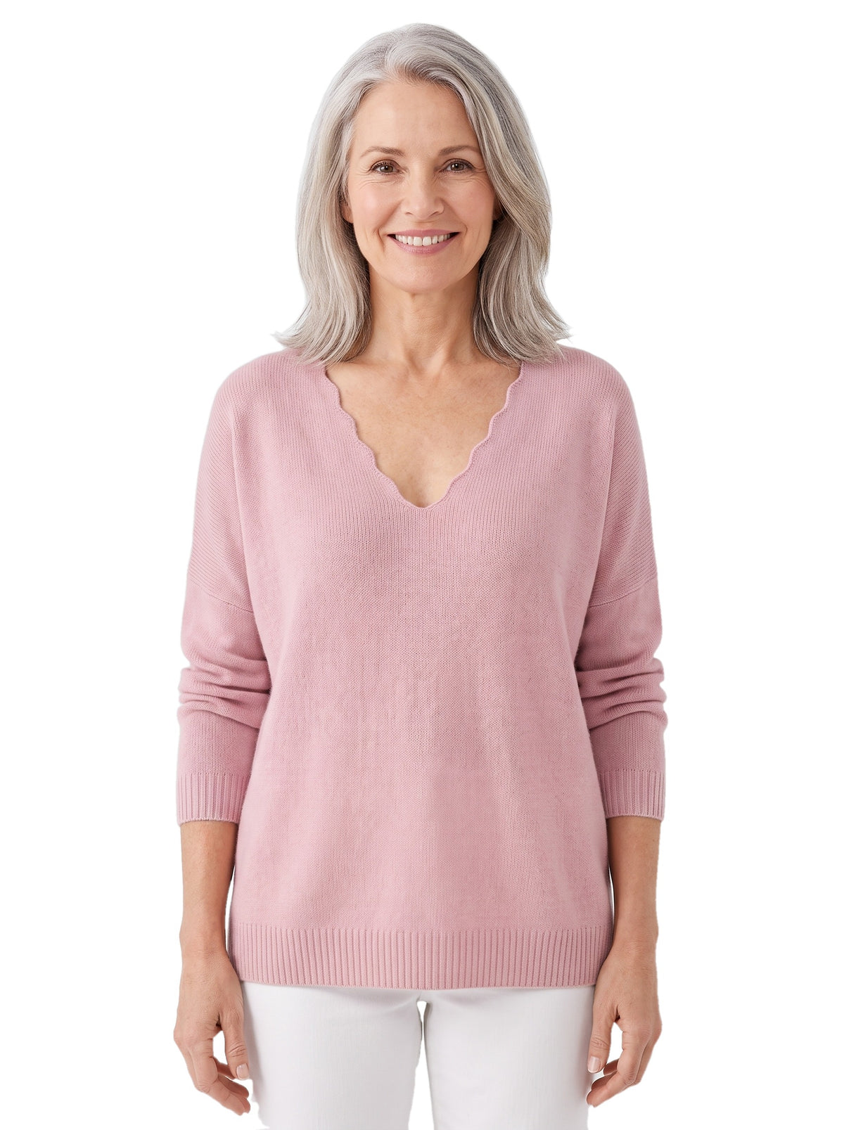 Bernadette Women's Scalloped V-Neck Sweater in pink, worn by a model
