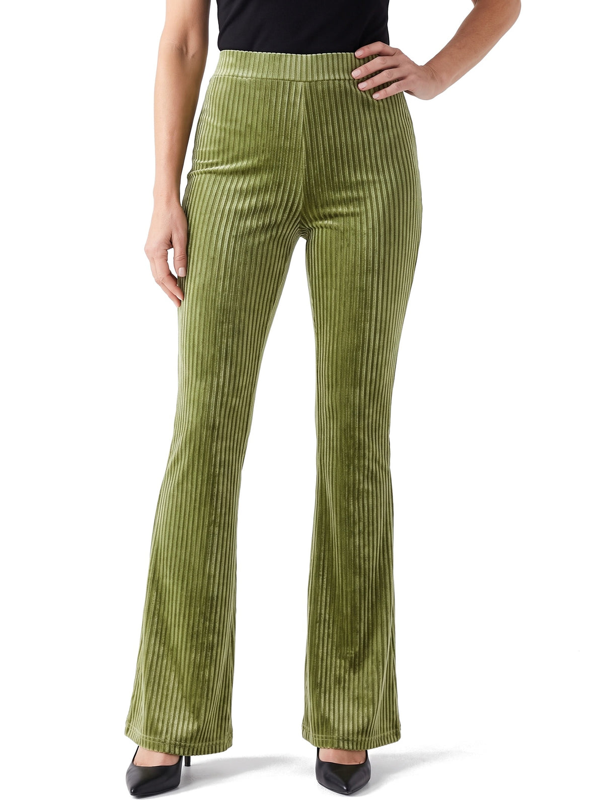 Celeste Women's Corduroy High-Waist Flare Pants in Light Green worn by a model, studio shot on white