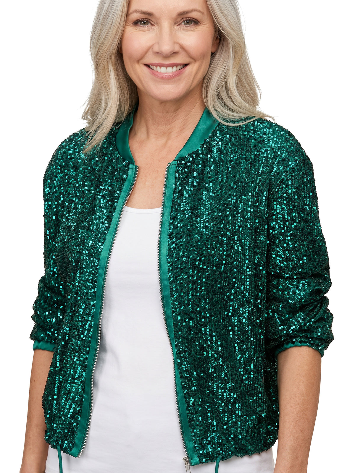 Women's emerald green sequin cropped bomber jacket worn open over a white top