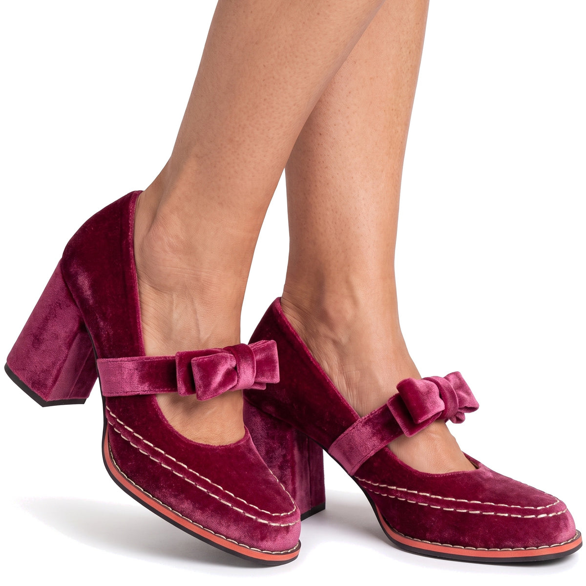 Women's berry velvet bow-tie Mary Jane block heel loafers worn on bare feet