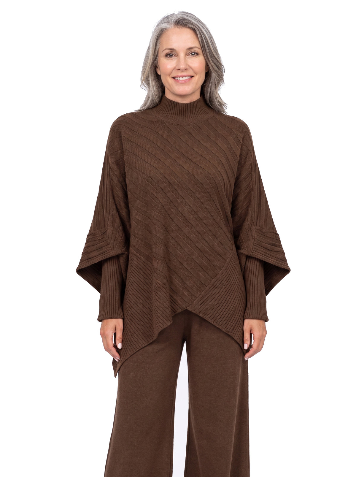 Woman wearing brown ribbed knit co-ord set with wide-leg trousers