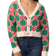 Woman wearing green and cream checkered cropped cardigan with red peppermint candy motifs