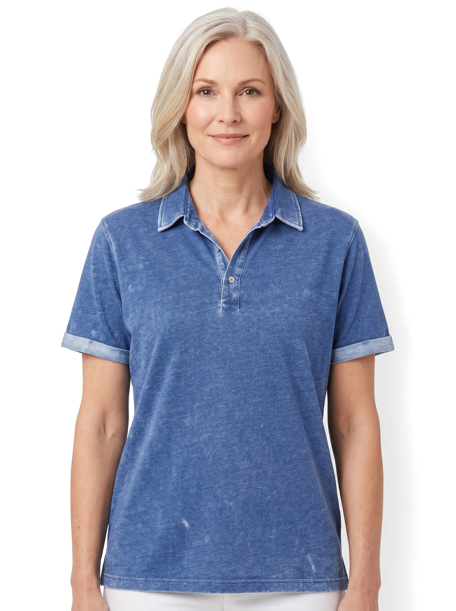 Woman wearing the Verna-Lorraine refined heritage polo shirt in washed indigo blue