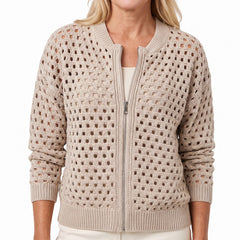 Woman wearing beige open-knit zip-through cardigan