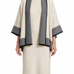 Woman wearing the Selma-Ruth draped cardigan midi dress set in cream with grey trim
