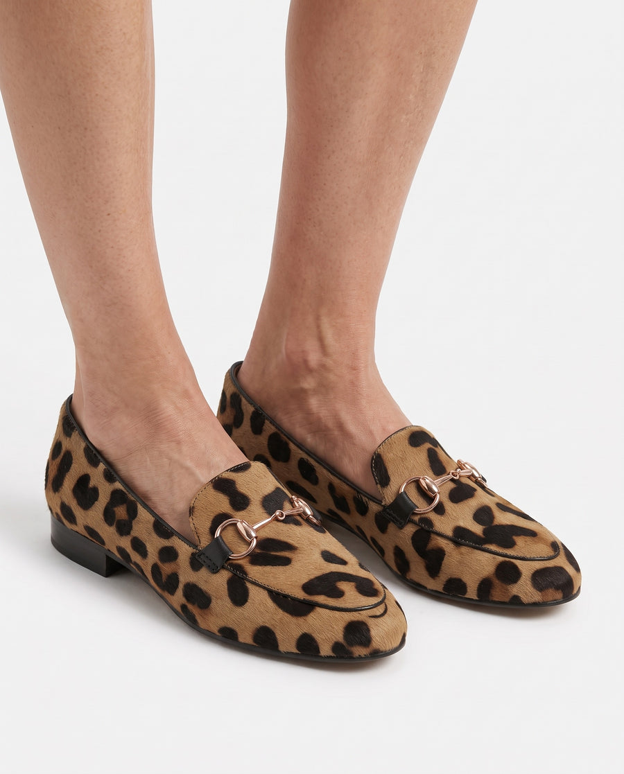 Women's Leopard-Print Pointed-Toe Loafers worn on feet